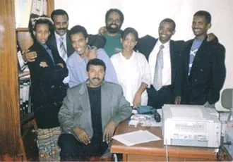 Setit's staff in happier days in 2000.