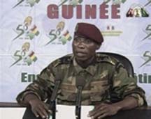 A spokesman for the Guinean coup's leaders reads a statement on TV today. (AP)