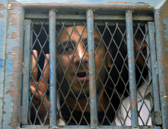 Amer is jailed for insulting the president and Islam. (Reuters)
