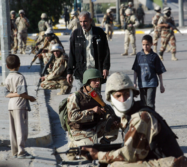 U.S. and Iraqi troops patrol Haifa Street in Baghdad during the deadly spring of 2005. (AP)