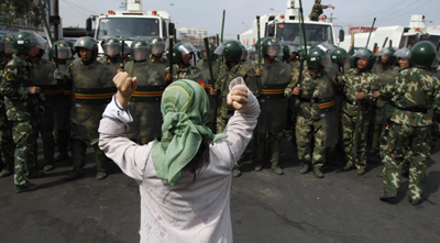 Uighur journalists who covered protests such as this one in 2009 were sentenced to harsh prison terms. (AP)