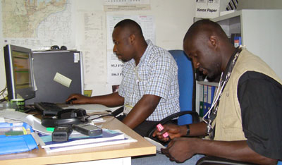 Didace Namujimbo, right, with colleague Serge Maheshe at Radio Okapi offices in 2006. Both were later murdered. (Déo Namujimbo)