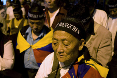 In Dharamsala, India, exiled Tibetans hold a vigil for the jailed filmmaker Dhondup Wangchen. (AP/Ashwini Bhatia)