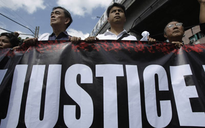 Journalists march in Manila. (AP/Bullit Marquez)