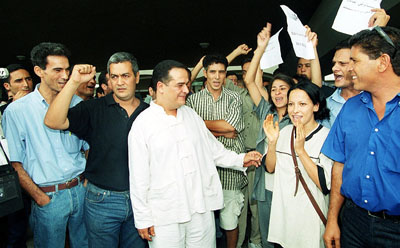 Ben Brik, center, after ending a six-week hunger strike to protest Tunisia's human rights record in 2000. (AFP)