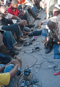 Charging cell phones at Radio Tele Caraïbes. (AFP/Nicholas Kamm)