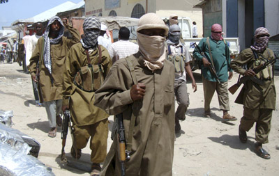 Al-Shabaab militants patrol Mogadishu's Bakara Market, home to several media outlets. (Reuters/Feisal Omar)