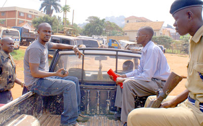 Ugandan police take two Monitor journalists to court. (Isaac Kasamani/Monitor)