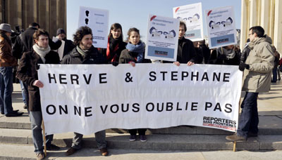 A rally in Paris seeks to publicize abductions. (AFP)