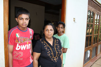 Sandhya Eknelygoda and her two sons. (CPJ/Bob Dietz)