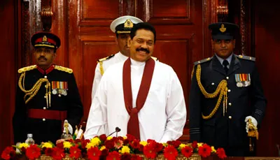 President Mahinda Rajapaksa at the swearing-in ceremony for his cabinet. (AP/Eranga Jayawardena)