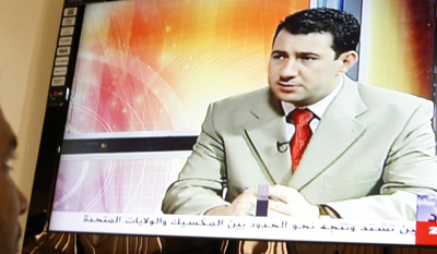 A clip of Riad al-Saray, an Al-Iraqiya anchor murdered in Baghdad. (AFP/Sabah Arar)