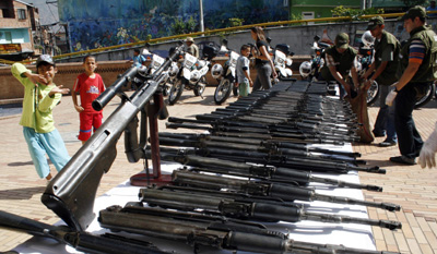 Colombian authorities seize a Los Paisas weapons cache in August 2009. (Reuter/Fredy Amariles)