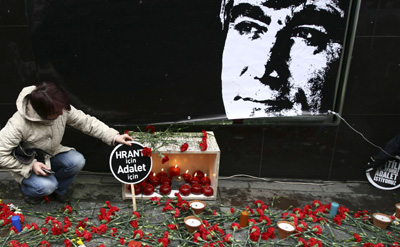 People keep vigils in hopes for justice in the murder of Hrant Dink. (Reuters)