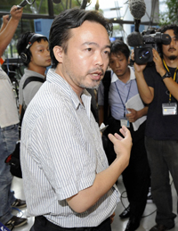 Tsuneoka arrives in Japan on Tuesday. (Reuters/Kyodo)