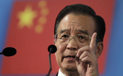 Premier Wen Jiabao says freedom will be "irresistable" in China, although the government censored his remarks. (AP/Yves Logghe)