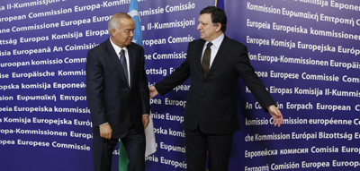 After defying the EU for years, Uzbek President Islam Karimov is welcomed by Jose Manuel Barroso, president of the European Commission. (Reuters/Thierry Roge)