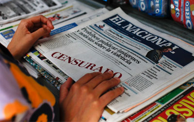 The Venezuelan newspaper El Nacional leaves white space for an image the government won't allow. (Reuters/Jorge Silva)