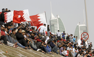 Bahraini anti-government protesters take a rest from demonstrations in central Manama, Bahrain. (Reuters/Hamad I Mohammed)