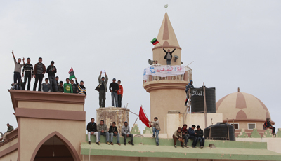 Protesters chant anti-government slogans in the main square of Tobruk, Libya, today. (Reuters/Asmaa Waguih)