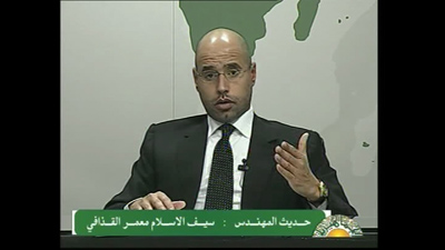 A screen grab taken from footage broadcast on Libyan state television on February 20 shows a televised address by Libyan leader Muammar Qaddafi's son Saif al-Islam. (AFP/LIBYAN TV)