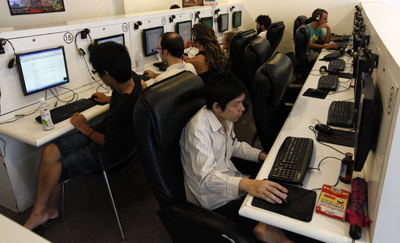 A Thai editor's trial is being held amid a vigorous government clampdown on the Internet. Seen here, an Internet cafe in Bangkok. (Reuters/Sukree Sukplang)