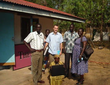 Mathia, right, with the staff of The Juba Post, including the author, center.