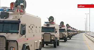 Saudi troops roll into Bahrain in this still image from Reuters video. (Reuters)