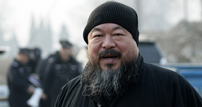 Michael Posner said he does not feel comforted from the response or lack of response on the recent detention of Ai Weiwei, seen here. (AP/Andy Wong)