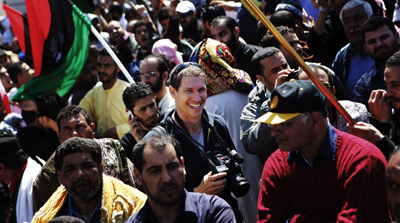 Hetherington working in Benghazi in March. (Reuters/Finbarr O'Reilly)