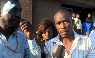 Muvi Television journalists are interviewed after an attack in Nakachenje. (Muvi)