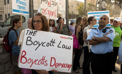 Israel's new law makes supporting boycott campaigns a civil offense. (AP)