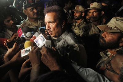 Pakistani Interior Minister Rehman Malik briefs Karachi's vibrant--and threatened--media in Karachi in May. (AP/Shakil Adil)