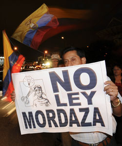 A protester decries the proposed communications law. (AP)