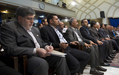 Ali Akbar Javanfekr, far left, director of the official Iranian News Agency, is among those recently charged. In this file photo, he attends a June presidential press conference. (Reuters/Caren Firouz)