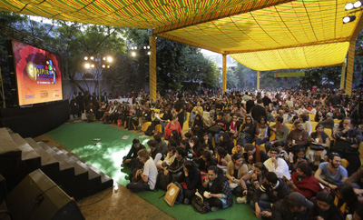 Visitors wait for Salman Rushdie's video conference at the Jaipur Literature Festival, which was called off after Muslim groups protested. (AP/Manish Swarup)