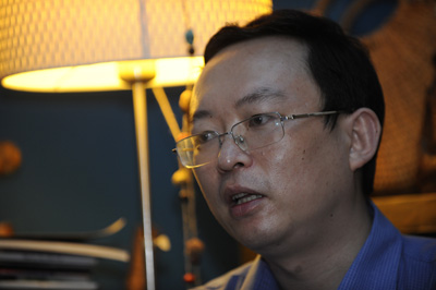 Writer Yu Jie was finally allowed to leave China. He arrived in Washington on Monday. (AFP/Peter Parks)