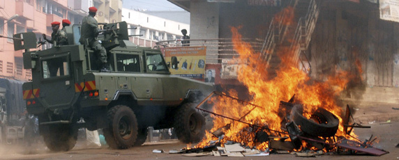Civil unrest grips downtown Kampala. Ugandan President Yoweri Museveni said journalists who covered the protests were 'enemies' of the country's development. (AP/Stephen Wandera)