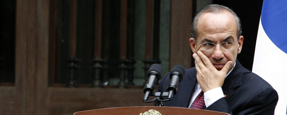 Mexican President Felipe Calderón Hinojosa pledged action to deter anti-press attacks, but his government has accomplished little. (AP/Marco Ugarte)