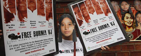 In Bangkok, a protester calls on Burma to free Hla Hla Win and three other imprisoned video reporters for the   Democratic Voice of Burma. (Reuters)