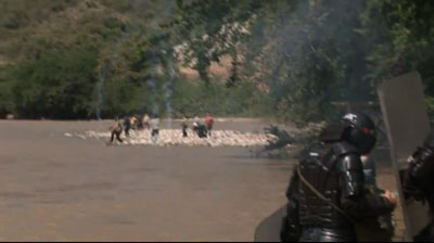 This screenshot from Sánchez's video is said to show police chasing protesters from the site of a proposed dam. (YouTube)