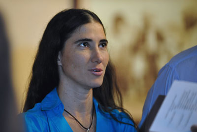 Blogger Yoani Sánchez says she has been denied permission to leave Cuba 19 times. (AFP/Adalberto Roque)