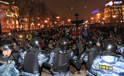 Police and protesters at Pushkin Square on Monday. (AP/Sergey Ponomarev)