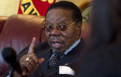 The government of Malawian President Bingu Wa Mutharika, pictured, has threatened journalists with fines and arrests for disrespecting him. (AFP/Alexander Joe)