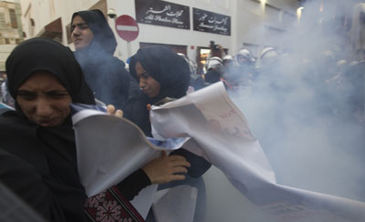 Police used sound grenades Wednesday to disperse an anti-government rally demanding the release of human rights activists in Manama. (Reuters/Darren Whiteside)