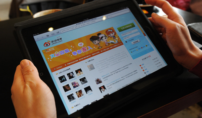 Authorities have suspended the comments feature on the Chinese microblog site Weibo, seen here, as a punishment for 'allowing rumors to spread.' (AFP/Mark Ralston)