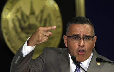 Salvadoran President Mauricio Funes denies that his government has engaged in negotiations with gangs to lower the rate of homicides. (AP/Luis Romero)