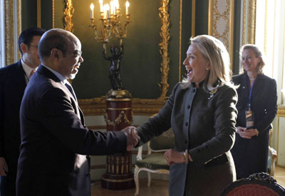 U.S. Secretary of State Hillary Clinton meets Ethiopian Prime Minister Meles Zenawi at a conference in London in February. Western governments are hesitant to press Ethiopia on human rights abuses. (AP/Jason Reed)