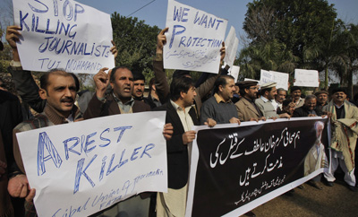Pakistani journalists rally against the killing of their colleague Mukarram Khan Atif. No arrests have been made in the case. (AP/Mohammad Sajjad)