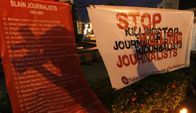 A poster of names lists journalists slain in the Philippines since 1986. (Reuters/Romeo Ranoco)